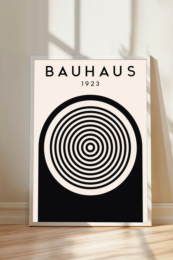 a poster with a minimalist design, featuring a large circular element with concentric circles and the text "BAHAU 23" displayed above it.
