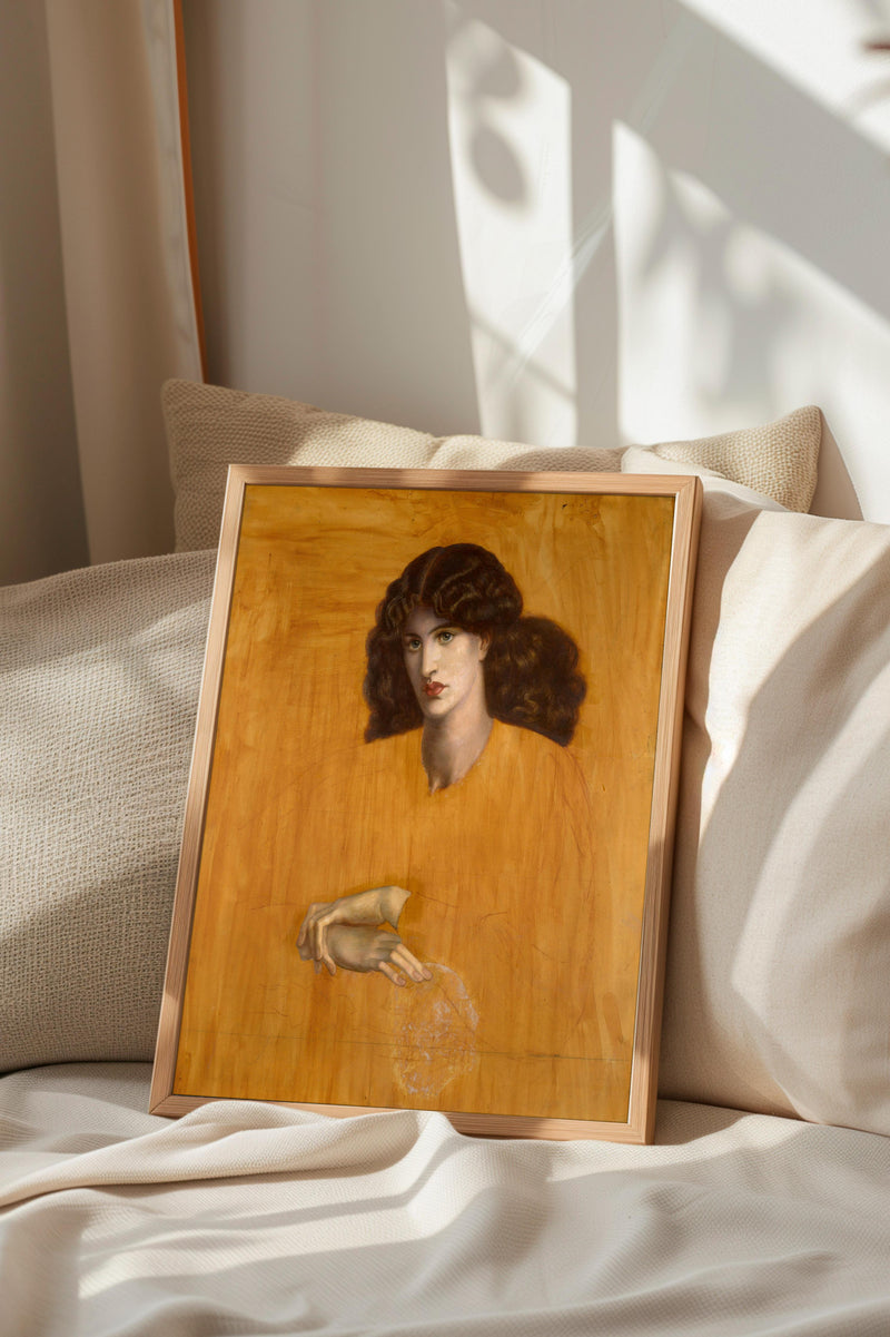 a framed painting of a woman with curly hair, displayed on a bed with a white comforter.