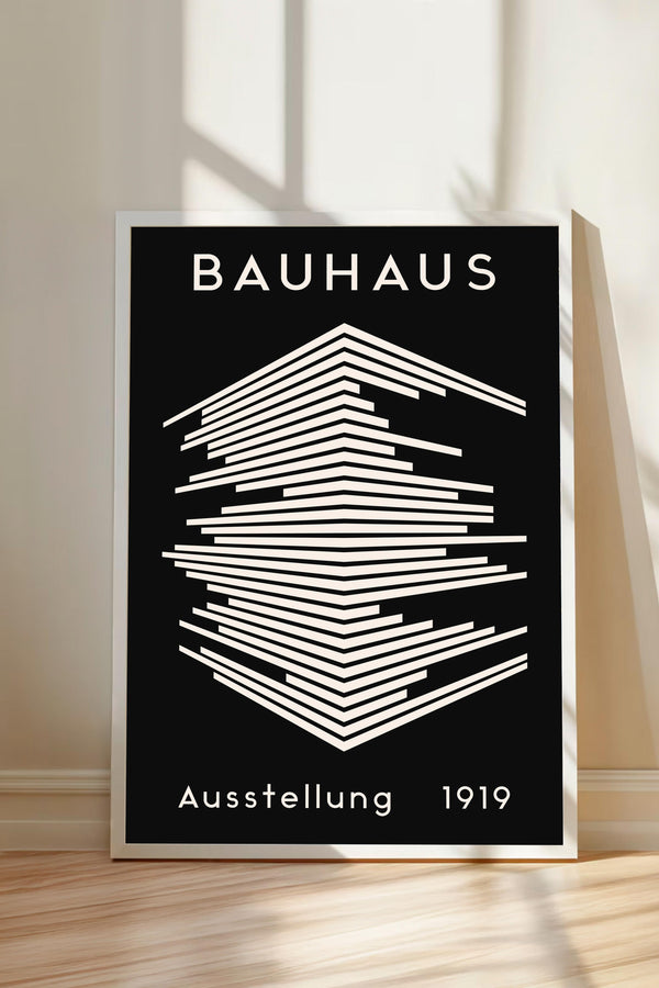 The image is a poster for the Bauhaus art school in 1919, featuring a minimalist design with a geometric pattern and bold text.
