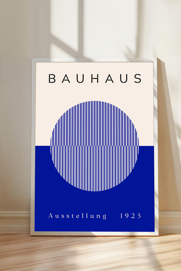 a poster with the text "BAHAUX" and "AUSTELLUNG 1923" on it, along with a blue circular design.