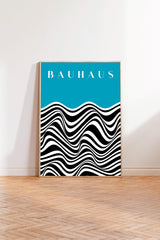 a poster with a blue background and a black and white wave pattern.