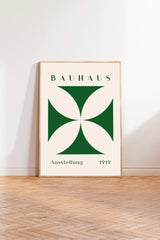 a poster of the Bauhaus art school, with a minimalist design and a green and white color scheme.