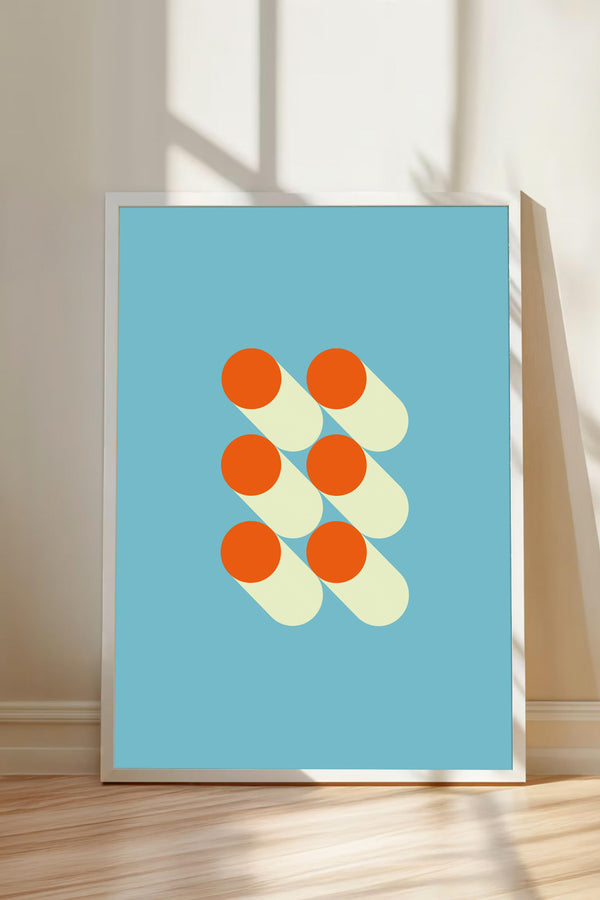 a framed abstract artwork with a blue background and a geometric design composed of overlapping circles in orange and white colors.