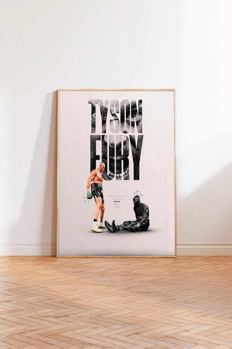 The image is a framed poster featuring a black and white image of a person standing and another person lying down, with the text "TYSON FURY" prominently displayed.
