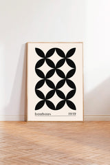 a minimalist black and white geometric design with a repeating pattern of circles on a beige background.