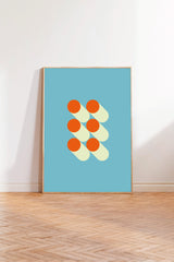 a blue poster with a geometric design of overlapping circles in orange and yellow colors.