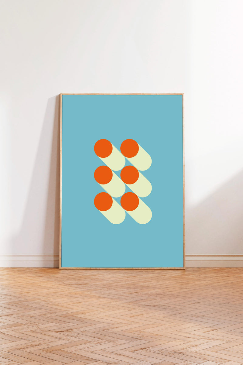 a blue poster with a geometric design of overlapping circles in orange and yellow colors.