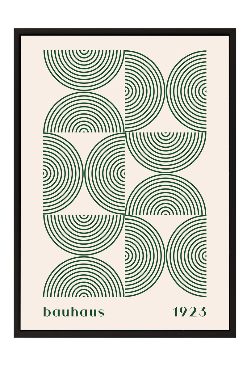 The image is a framed poster featuring a repeating pattern of green circles and lines, with the text "bauhaus 1923" below the design.