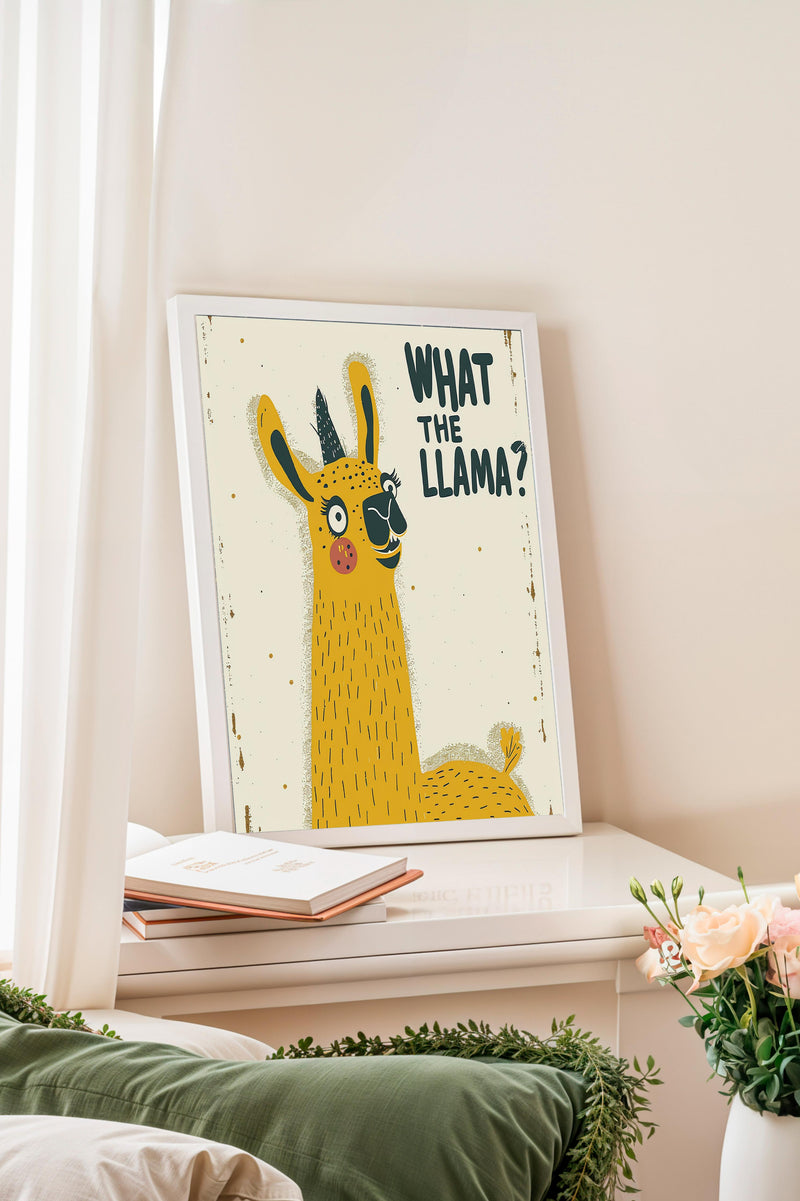a framed illustration of a yellow llama with the text "WHAT THE LLAMA?" displayed on it.