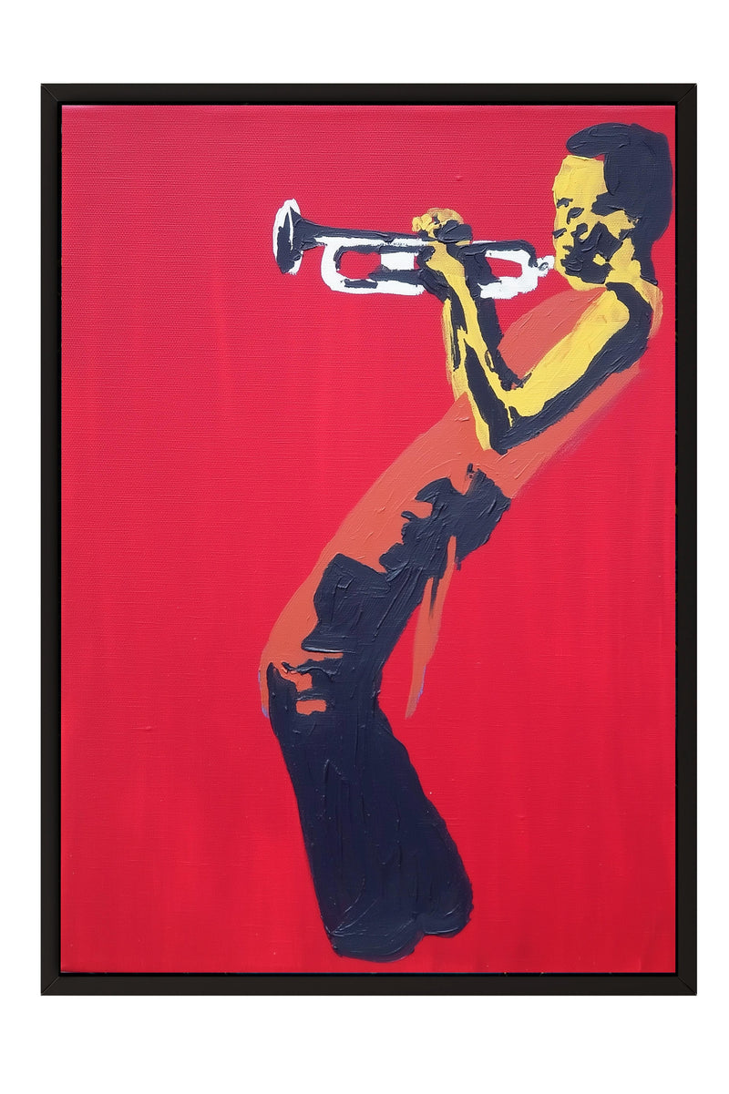 A person playing a trumpet against a red background.