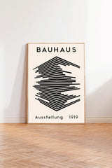 a poster of the Bauhaus art school, with a minimalist design of stacked lines in black and white.