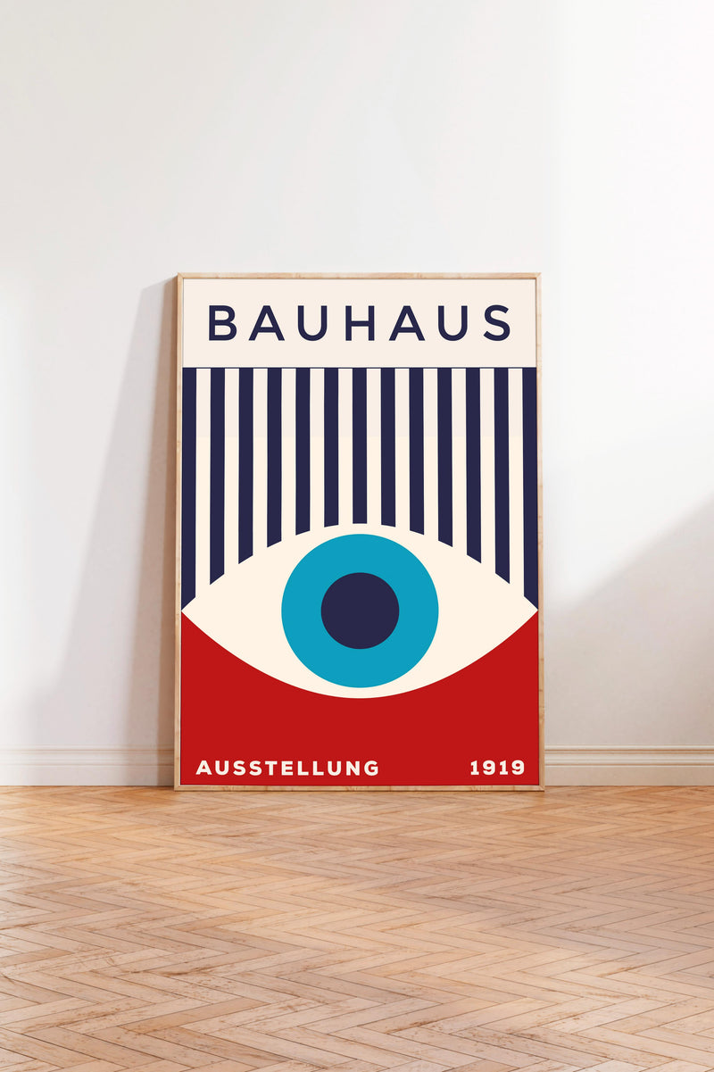 a poster of the Bauhaus art school, with a large eye design and the text "Bauhaus" prominently displayed.