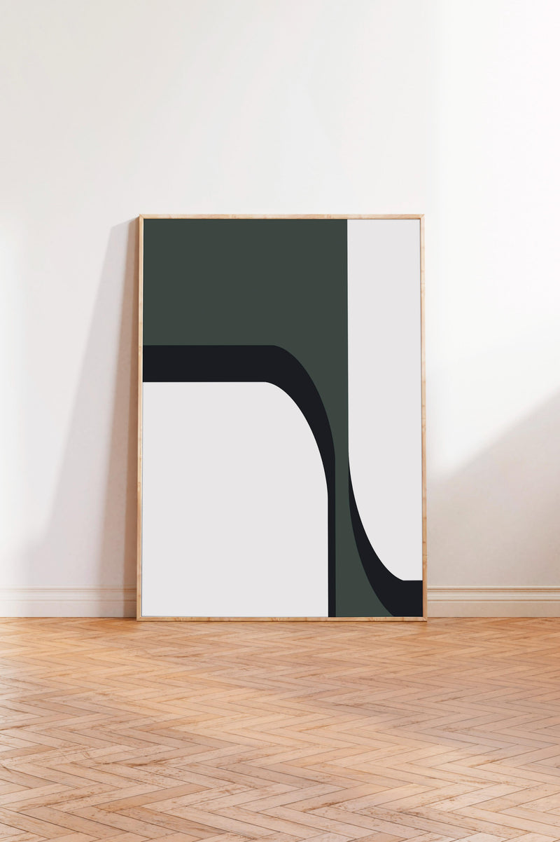 a minimalist art piece with a large white square frame and a black and white abstract design on a wooden floor.