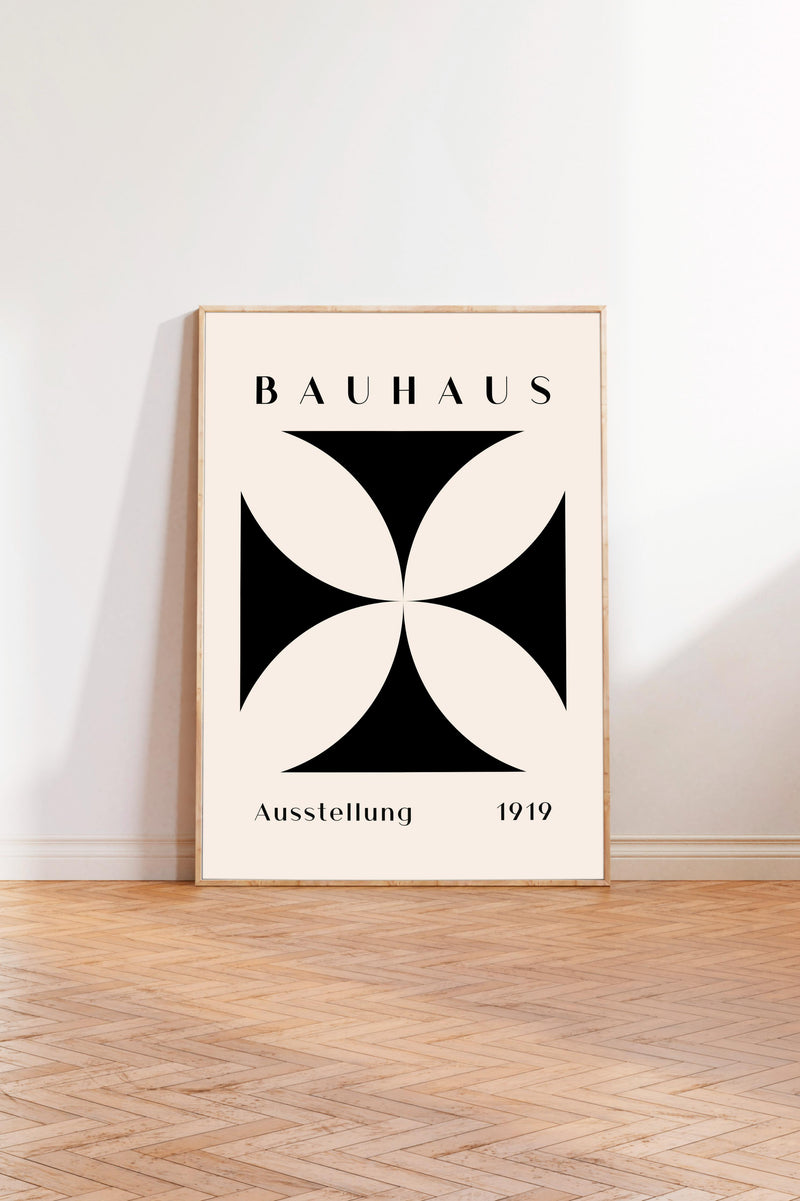 a minimalist poster of the Bauhaus art school, with a geometric design in black and white.
