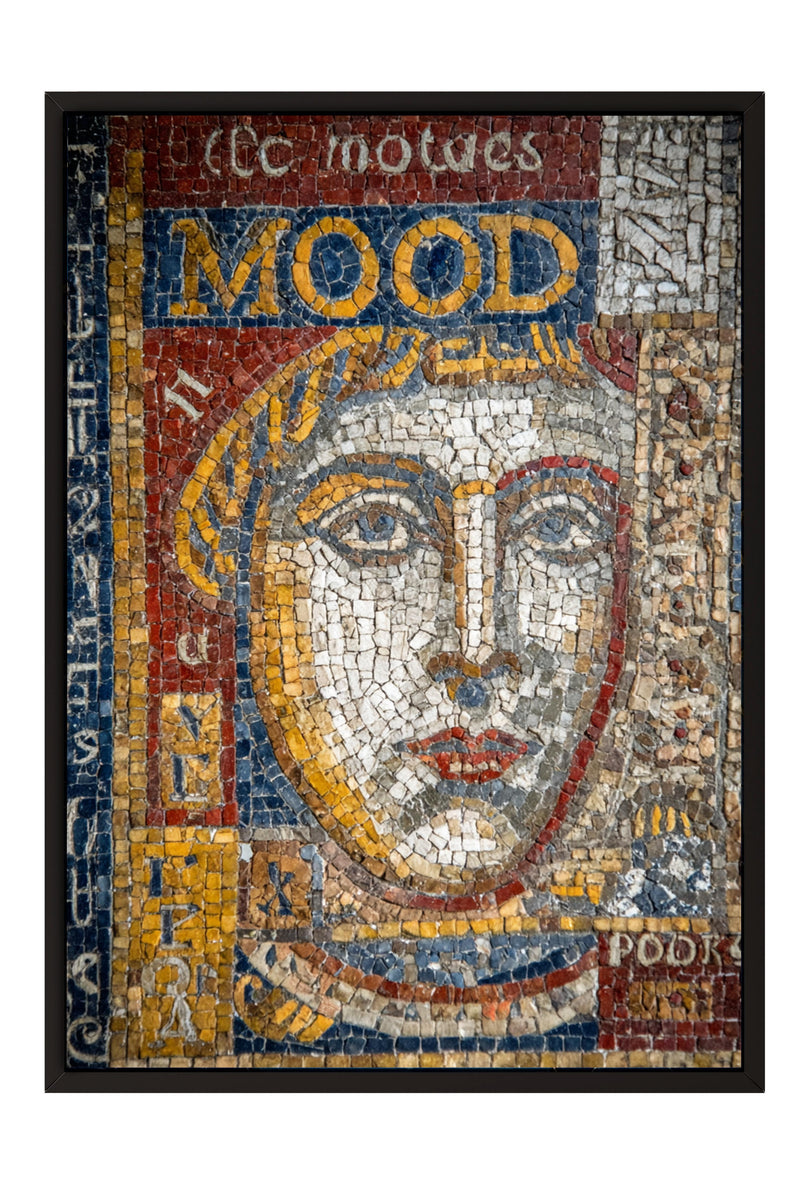 The image is a mosaic depicting a woman's face, with various colors and patterns arranged to create a visually striking composition.