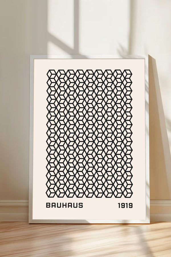 a framed poster with a repeating geometric pattern in black and white.