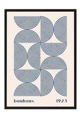 The image is a framed poster featuring a repeating pattern of blue circles and lines, with the text "bauhaus 1923" below the design.