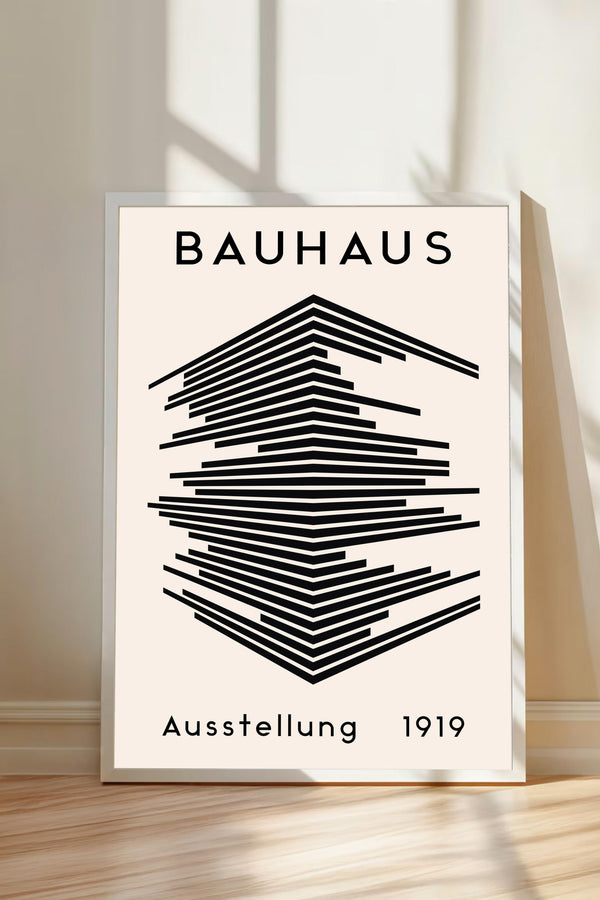 The image is a poster for the Bauhaus art school, featuring a geometric design with lines and shapes in black and white.