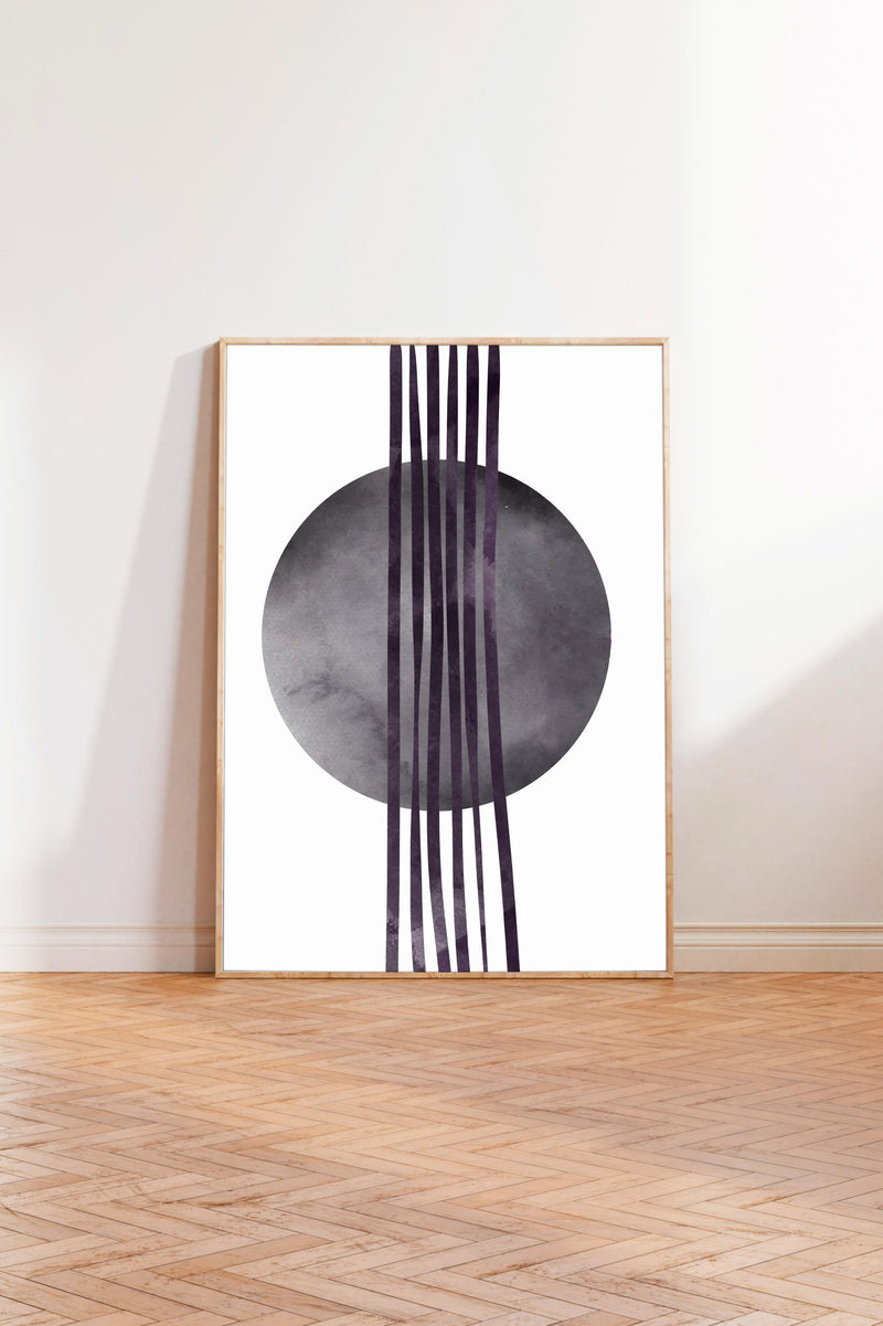 a minimalist art piece with a large circular shape and vertical lines extending from it, creating a striking visual contrast against the white background.