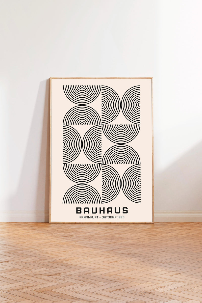 a minimalist poster of Bauhaus, a renowned art school and architect, with a repeating pattern of circles and lines in black and white.