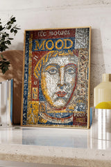 a framed mosaic artwork depicting a woman's face, with the text "Mood" prominently displayed.
