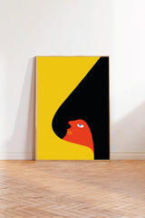 a bold, abstract artwork with a striking contrast of yellow and black. The artwork is framed and displayed on a wall, creating a visually striking and dynamic composition.